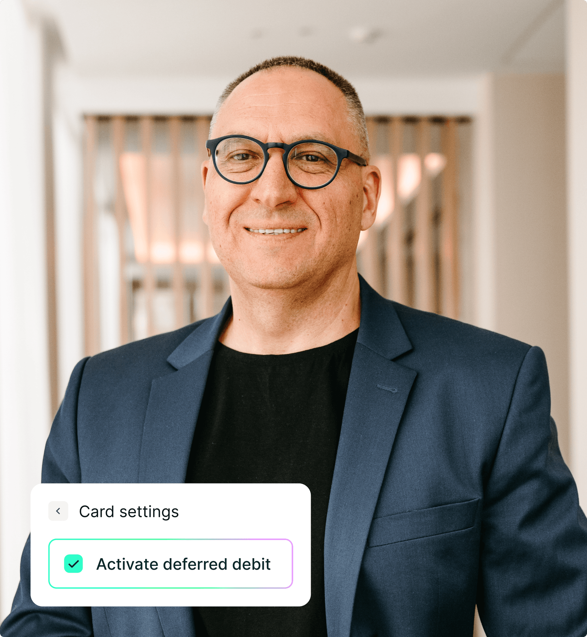 A CEO of a card company enabling deferred debit in their card settings on the Aria platform.